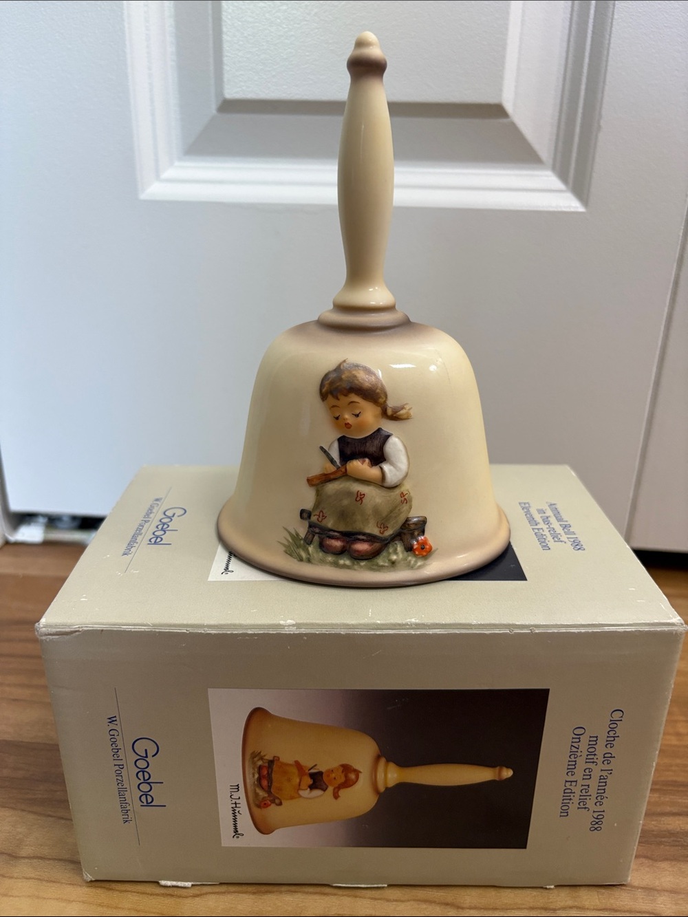 Goebel Cream and Gold Annual Bell with Hummel Girl Motif